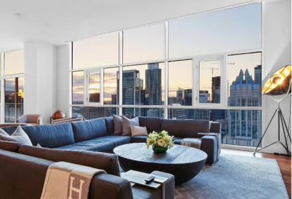 luxury condo with city skyline through the window
